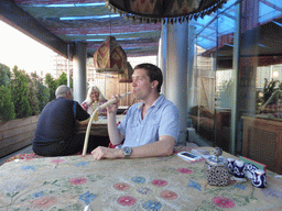 Tim with waterpipe at the Vostok Story restaurant at Yevropy Square