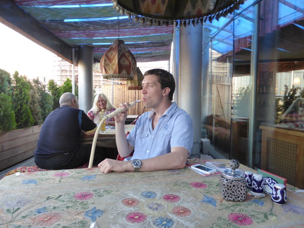 Tim with waterpipe at the Vostok Story restaurant at Yevropy Square