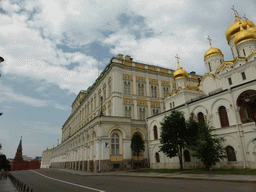 South side of the Cathedral of the Annunciation, the Grand Kremlin Palace and the Borovitskaya Tower at the Borovitskaya street at the Moscow Kremlin