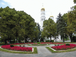Flower bed at the Large Kremlin Square and the towers of the Ivan the Great Belltower at the Moscow Kremlin