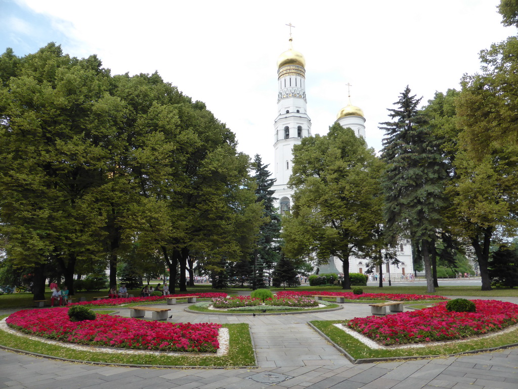 Flower bed at the Large Kremlin Square and the towers of the Ivan the Great Belltower at the Moscow Kremlin