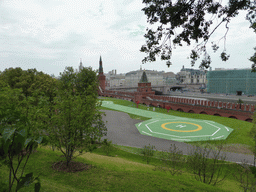 Southeast side of the Moscow Kremlin with a helicopter deck and the Bolshoy Moskvoretsky Bridge over the Moskva river, viewed from the Large Kremlin Square