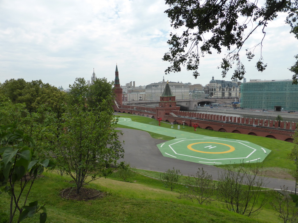 Southeast side of the Moscow Kremlin with a helicopter deck and the Bolshoy Moskvoretsky Bridge over the Moskva river, viewed from the Large Kremlin Square