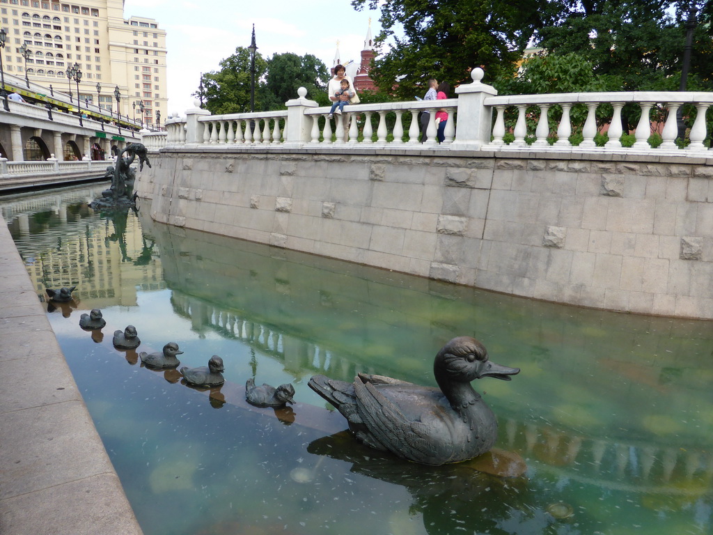 Fountain with a duck and six ducklings at the Neglinnaya River at the Alexander Garden