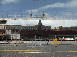 Construction of a stage at the Red Square, with a reflection of the Senatskaya Tower and the Senate Palace of the Moscow Kremlin