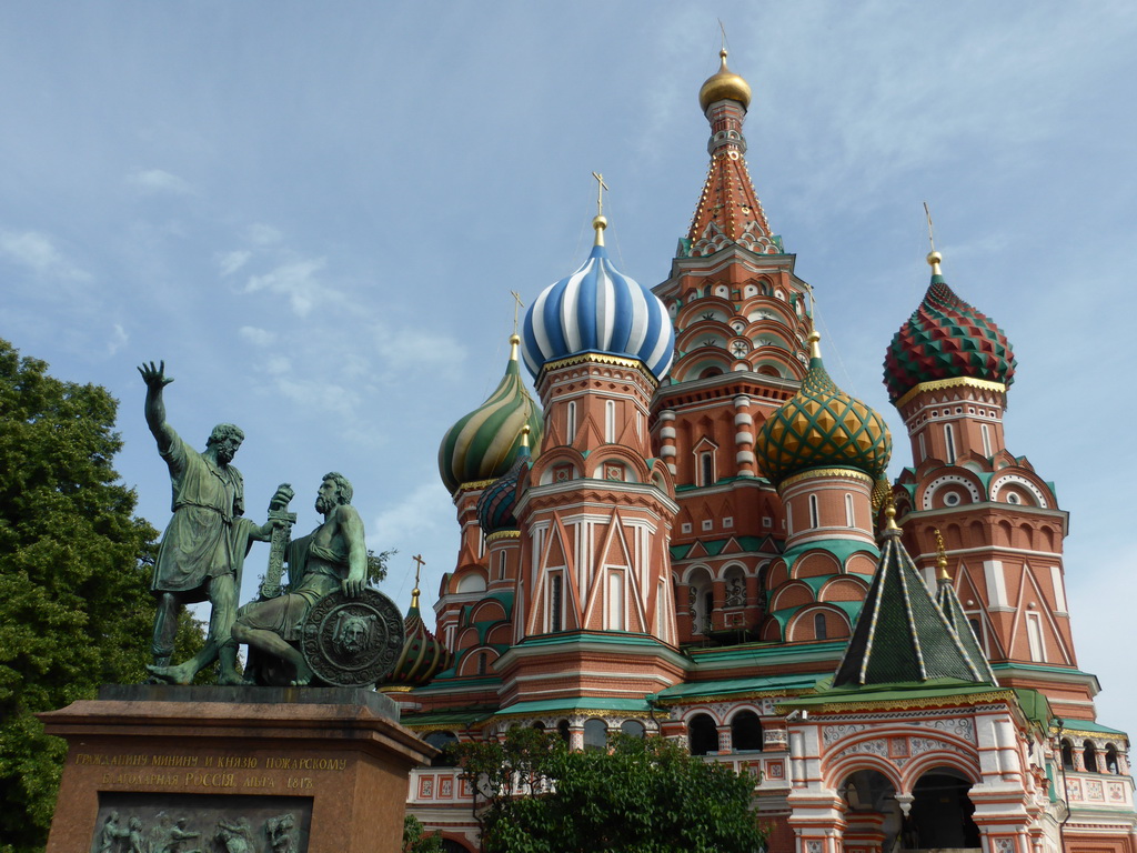 The upper parts of the front of Saint Basil`s Cathedral and the Monument to Minin and Pozharsky at the Red Square