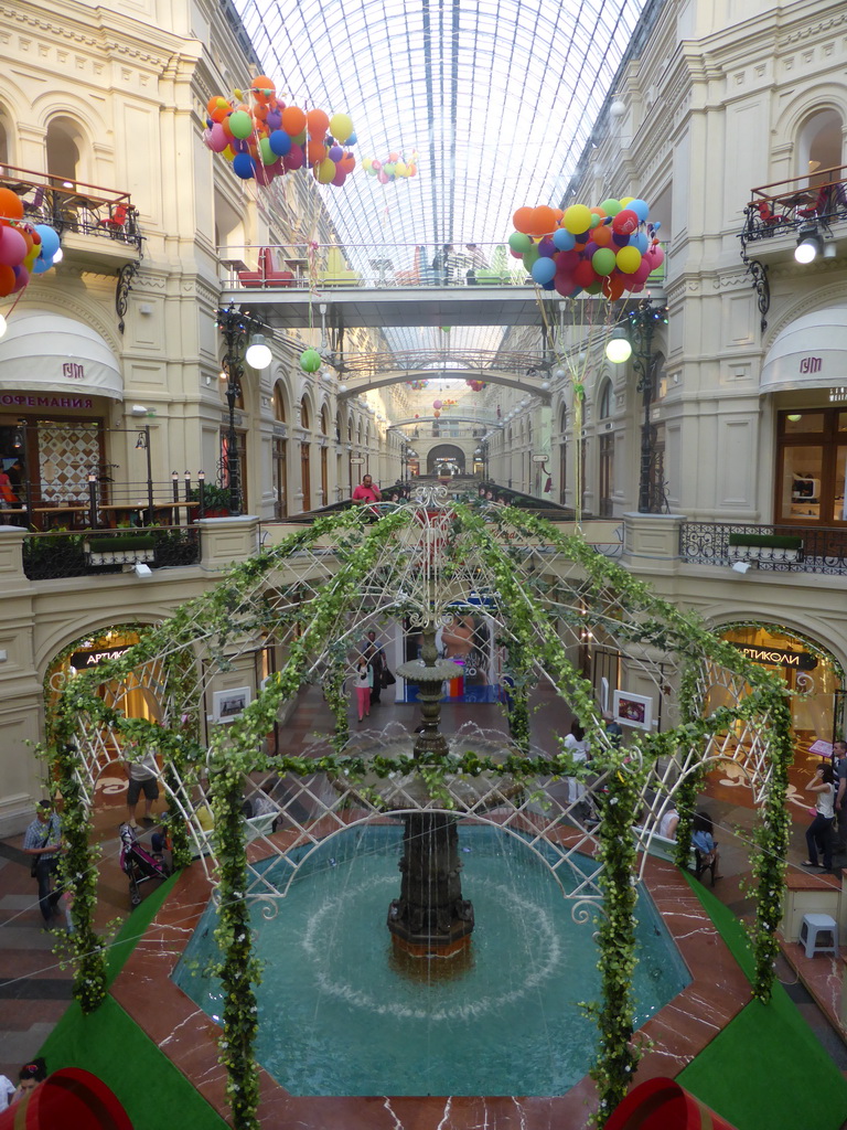 Fountain at a street in the GUM shopping center, viewed from the first floor