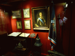 Portrait of Peter the Great, hand print, cannon, bell, flag and a scale model of a ship in the House of Peter the Great at the Kolomenskoye estate