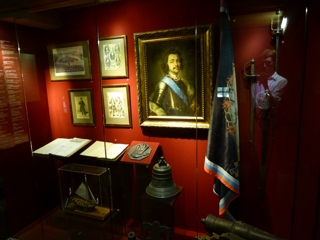 Portrait of Peter the Great, hand print, cannon, bell, flag and a scale model of a ship in the House of Peter the Great at the Kolomenskoye estate