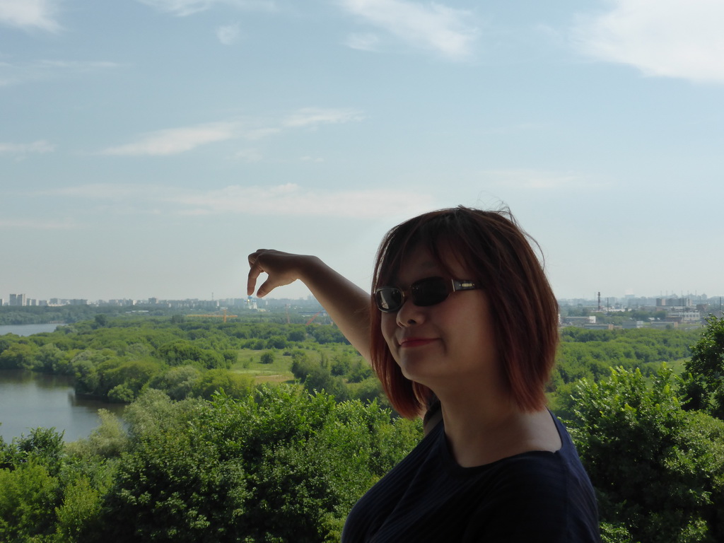 Miaomiao at the Gallery at the Church of the Ascension at the Kolomenskoye estate, with a view on the Nikolo-Perervinsky Monastery and the Moskva river and surroundings