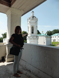 Miaomiao at the Gallery at the Church of the Ascension at the Kolomenskoye estate, with a view on the Bell Tower of St. George at the Tsar`s Courtyard