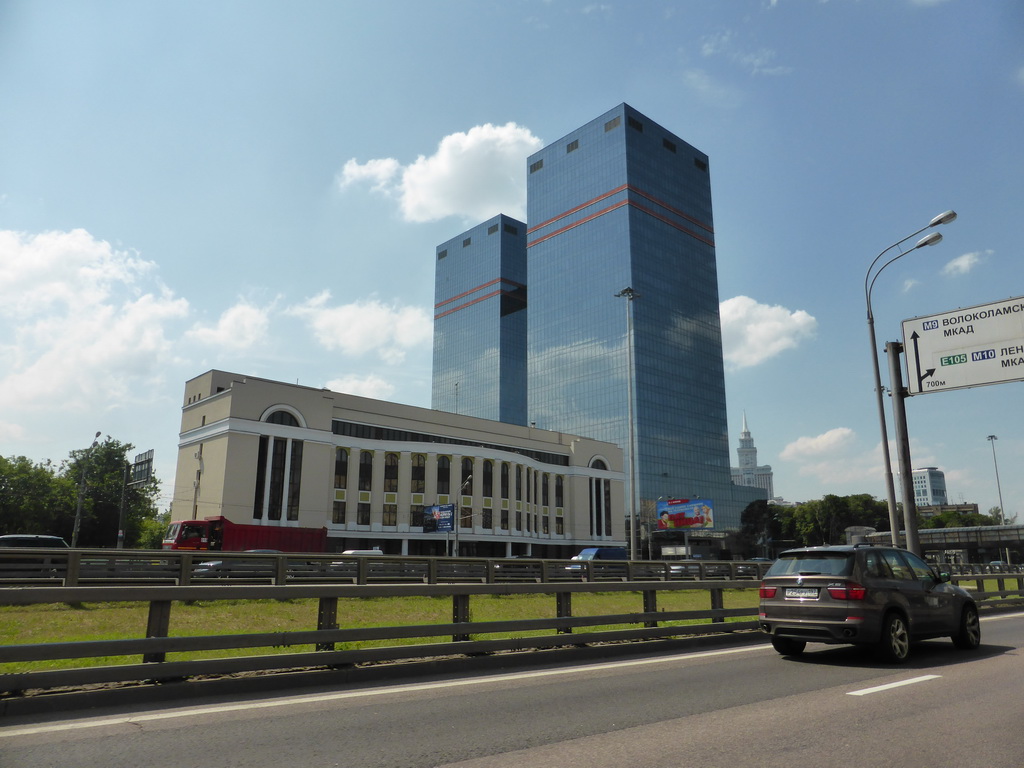 The SkyLight skyscrapers next to the Leningradskiy street, viewed from the taxi to the airport