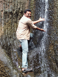 Our driver and a waterfall near the Kanheri Caves