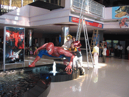 David, Rick and Swapnil with a Spider-Man statue in the IMAX Adlabs Theater