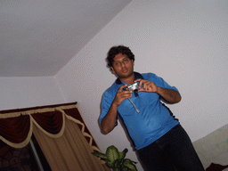 Swapnil with the photo camera in the apartment of Anand`s family