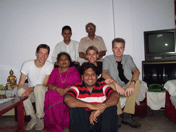 Tim, David, Rick and Anand`s parents and brothers in the apartment of Anand`s family