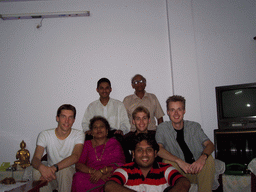 Tim, David, Rick and Anand`s parents and brothers in the apartment of Anand`s family