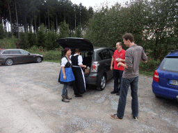 Miaomiao in Bavarian clothes and our friends at a parking lot along the road from Nijmegen