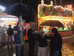 Miaomiao and friends having snacks at the Oktoberfest terrain at the Theresienwiese square, by night