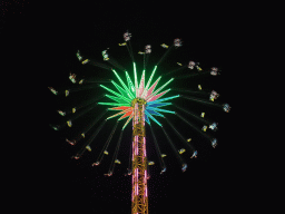 Funfair attraction at the Oktoberfest terrain at the Theresienwiese square, by night