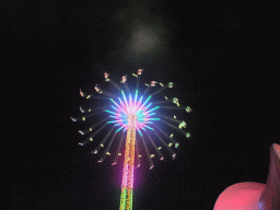 Funfair attraction at the Oktoberfest terrain at the Theresienwiese square, by night