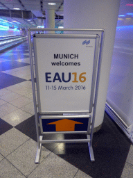 Sign for the EAU16 conference at the Arrivals Hall of Munich Airport