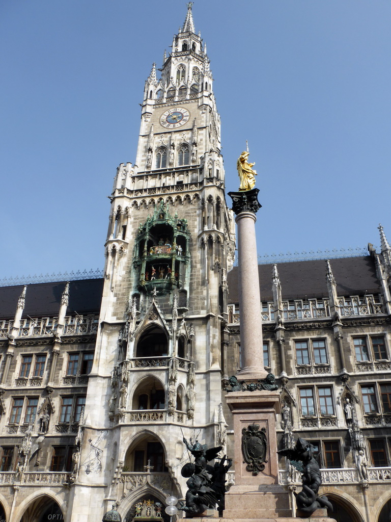 Tower of the Neues Rathaus building and the Mariensäule column at the Marienplatz square