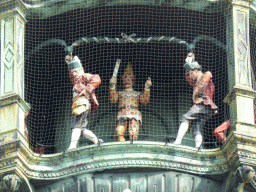 Figures at the lower part of the Rathaus-Glockenspiel chimes in the tower of the Neues Rathaus building