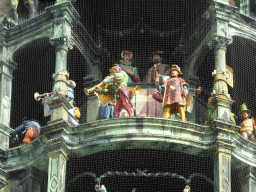 Figures at the upper part of the Rathaus-Glockenspiel chimes in the tower of the Neues Rathaus building, during the story of the marriage of the local Duke Wilhelm V to Renata of Lorraine