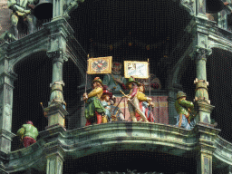 Figures at the upper part of the Rathaus-Glockenspiel chimes in the tower of the Neues Rathaus building, during the story of the marriage of the local Duke Wilhelm V to Renata of Lorraine