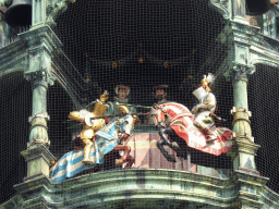 Figures at the upper part of the Rathaus-Glockenspiel chimes in the tower of the Neues Rathaus building, during the story of the marriage of the local Duke Wilhelm V to Renata of Lorraine