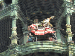 Figures at the upper part of the Rathaus-Glockenspiel chimes in the tower of the Neues Rathaus building, during the story of the marriage of the local Duke Wilhelm V to Renata of Lorraine