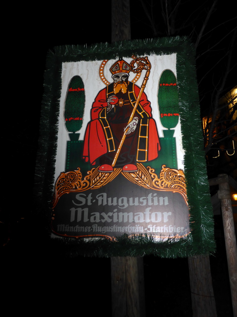 Sign in the beer garden of the Augustiner Keller beer hall, by night