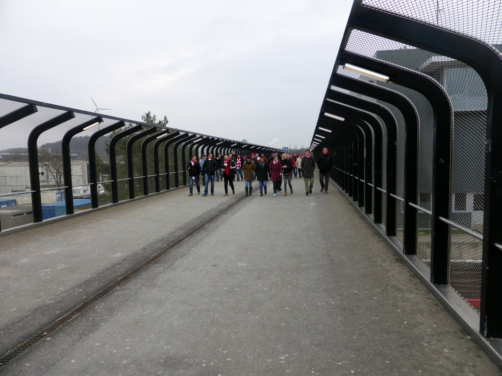FC Bayern Munich fans at the pedestrian bridge at the Fröttmaning metro station