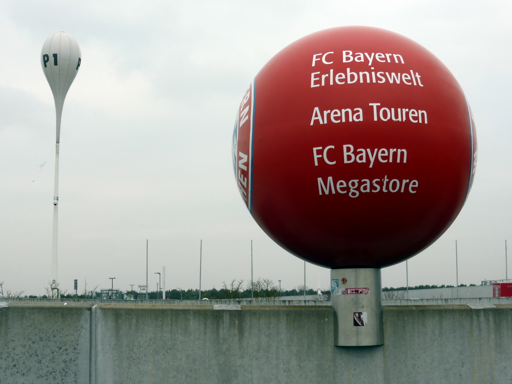 Signs of the P1 parking and the FC Bayern Munich museum, tour and store, at the south road to the Allianz Arena stadium