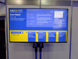 Screen with information on poster presentations from poster session 75 in front of the Madrid room of the EAU16 conference at Hall B2 of the International Congress Center Munich