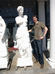 Tim and female statue at pottery shop near Mycenae