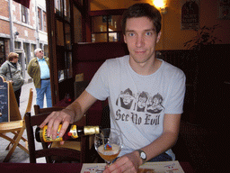 Tim with a Leffe Blond beer in the Brasserie l`Alternative restaurant