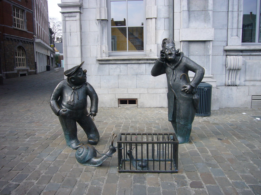 Statues `Djoseph et Françwès` by Jean Legrand in front of the Namur Palais des Congrès building at the Place d`Armes square