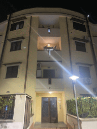 Front of the building of the House of Mola apartment at the Via della Stadera street, by night