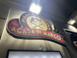 Sign at the facade of the Pizzeria A Casa di Marco at the Via Nazionale delle Puglie street, by night
