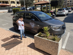 Max with our rental car in front of the House of Mola apartment at the Via della Stadera street