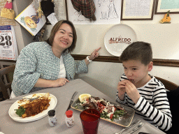 Miaomiao and Max having dinner at the Trattoria Pizzeria `Da Alfredo` a Poggioreale restaurant