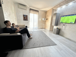 Tim and Max playing FIFA 23 on the Nintendo Switch in the living room of the House of Mola apartment