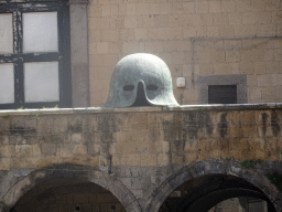 Helmet statue at the inner square of the Castel Nuovo castle, viewed from the Vestibule