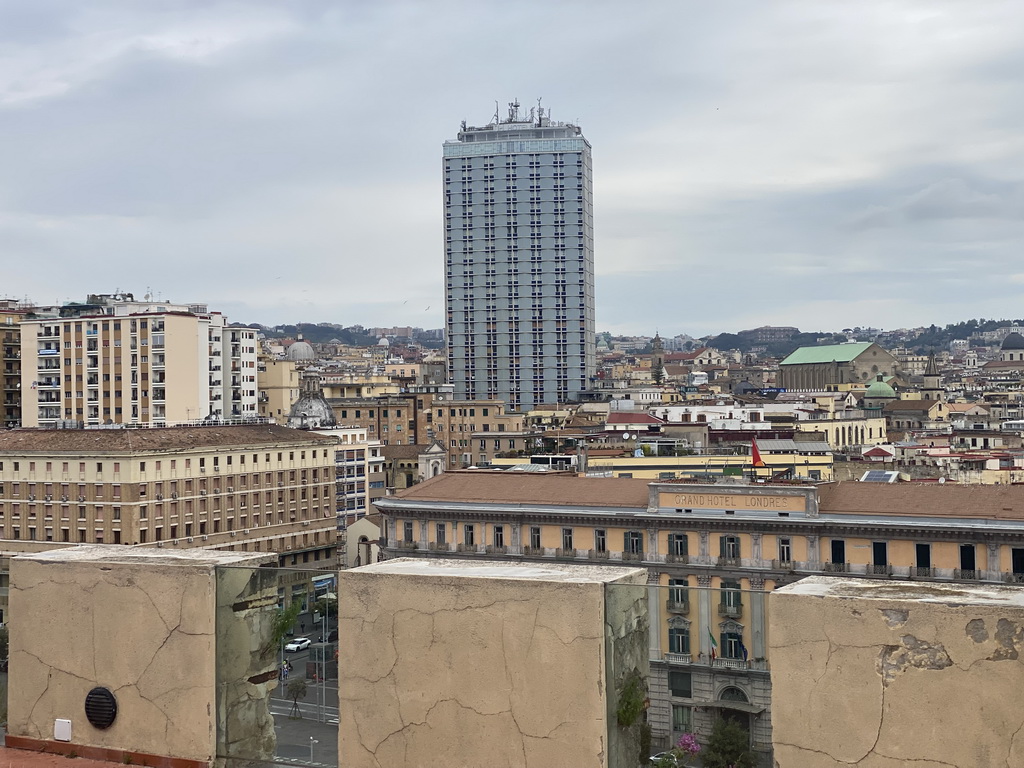 The city center with the Hotel NH Napoli Panorama and the Museo Di Santa Chiara museum, viewed from the north side of the roof of the Castel Nuovo castle