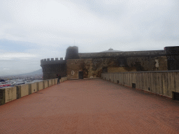 Northeast side of the roof of the Castel Nuovo castle with the Beverello Tower, with a view on the Naples Port