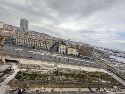 Ruins at the Piazza Municipio square, the Naples Port and the city center with the Hotel NH Napoli Panorama, viewed from the north side of the roof of the Castel Nuovo castle