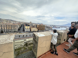 Max at the north side of the roof of the Castel Nuovo castle, with a view on the ruins at the Piazza Municipio square, the Naples Port, the city center and Mount Vesuvius