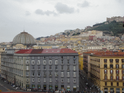 Dome of the Galleria Umberto I gallery and the Vomero Hill with the Castel Sant`Elmo castle and the Museo Nazionale di San Martino museum, viewed from the northwest side of the roof of the Castel Nuovo castle